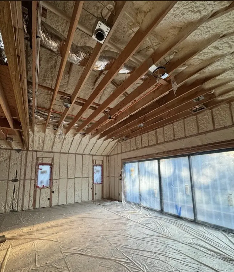 Interior walls and ceiling insulated with spray foam during new construction in Sidney
